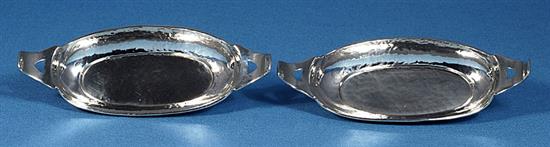 A pair of Edwardian Arts & crafts silver oval navette shaped dishes, by Liberty & Co, Length 139mm, weight 2.8oz/90grms